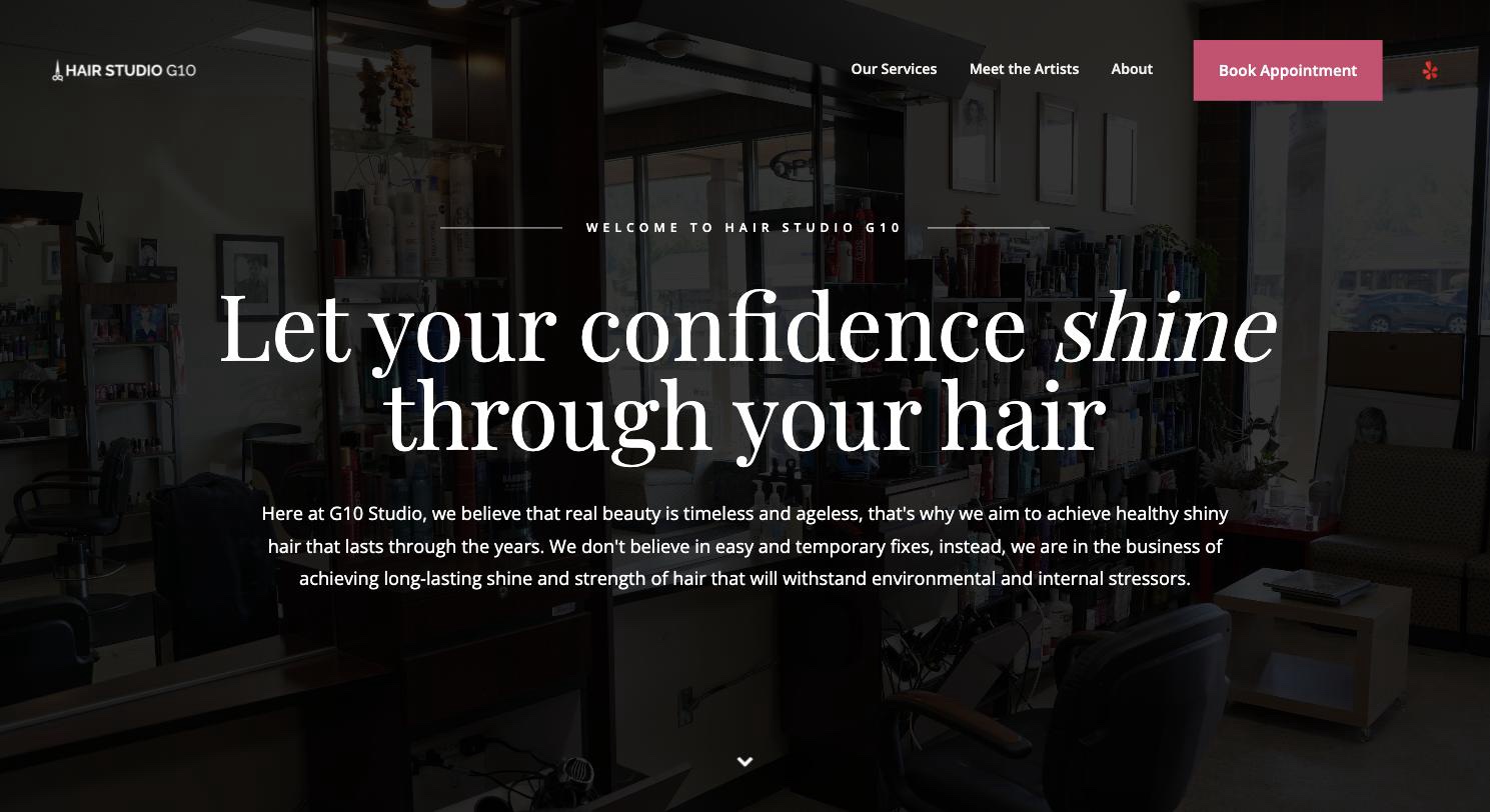 hairstudiog10.com homepage hero: dark salon photography, the serif headline with one italic word, and the rose Book Appointment button